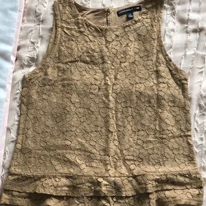 Lace tank top with ruffles on the bottom